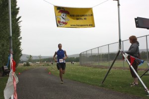 Kurtis crossing the finish line