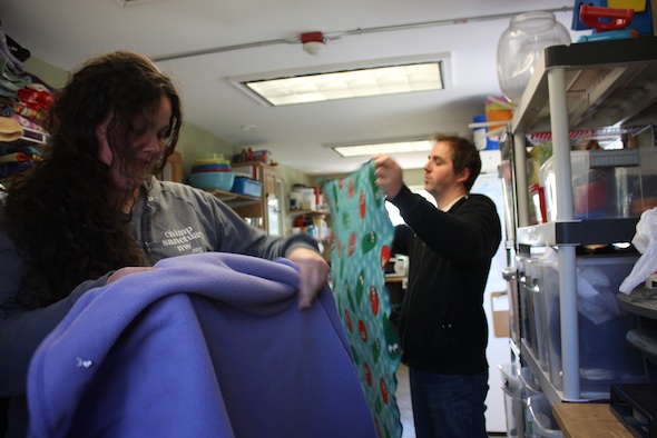 web jen matt volunteers fold blanket laundry (dm) IMG_2104